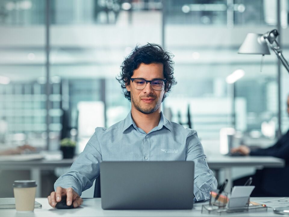 Man sitting in front of a computer