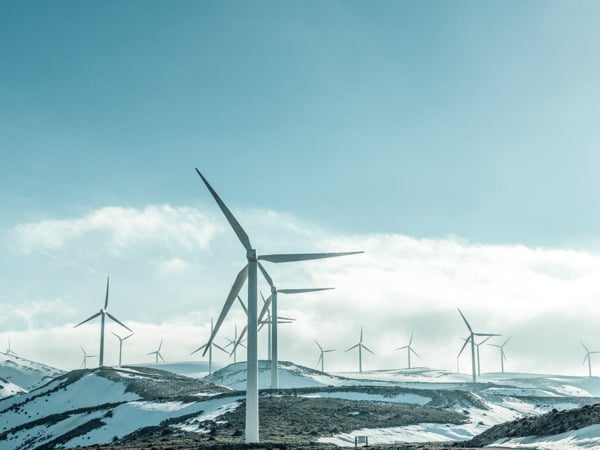 Wind turbines in a snowy field