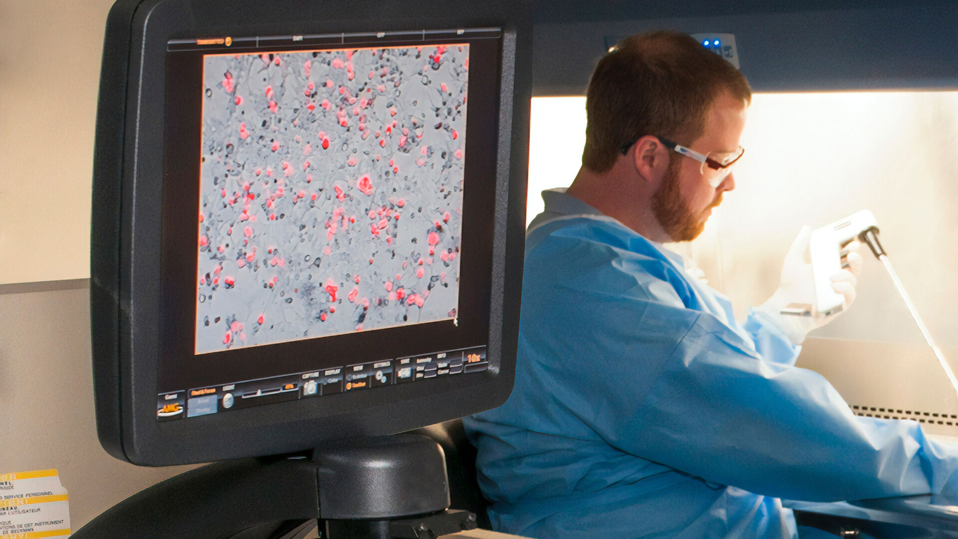 Man in lab coat testing filters