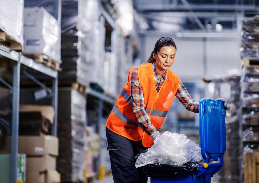 A woman working in a warehouse