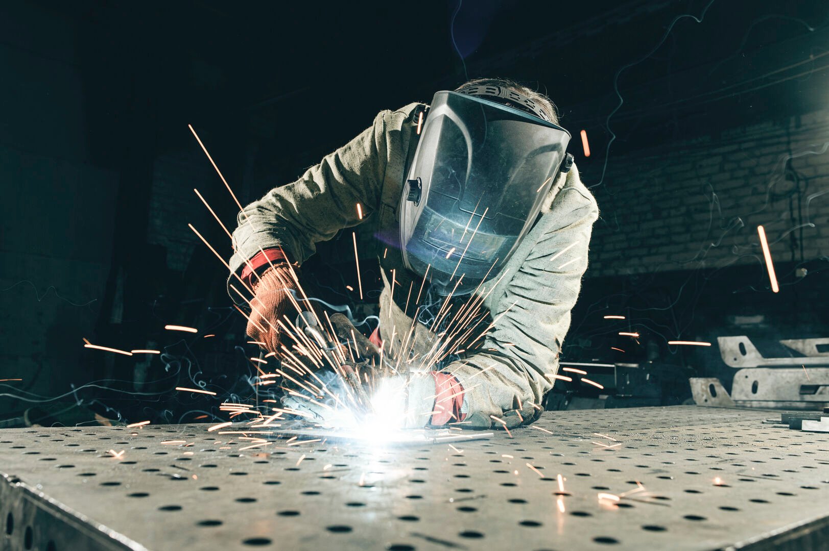 Person working on metal