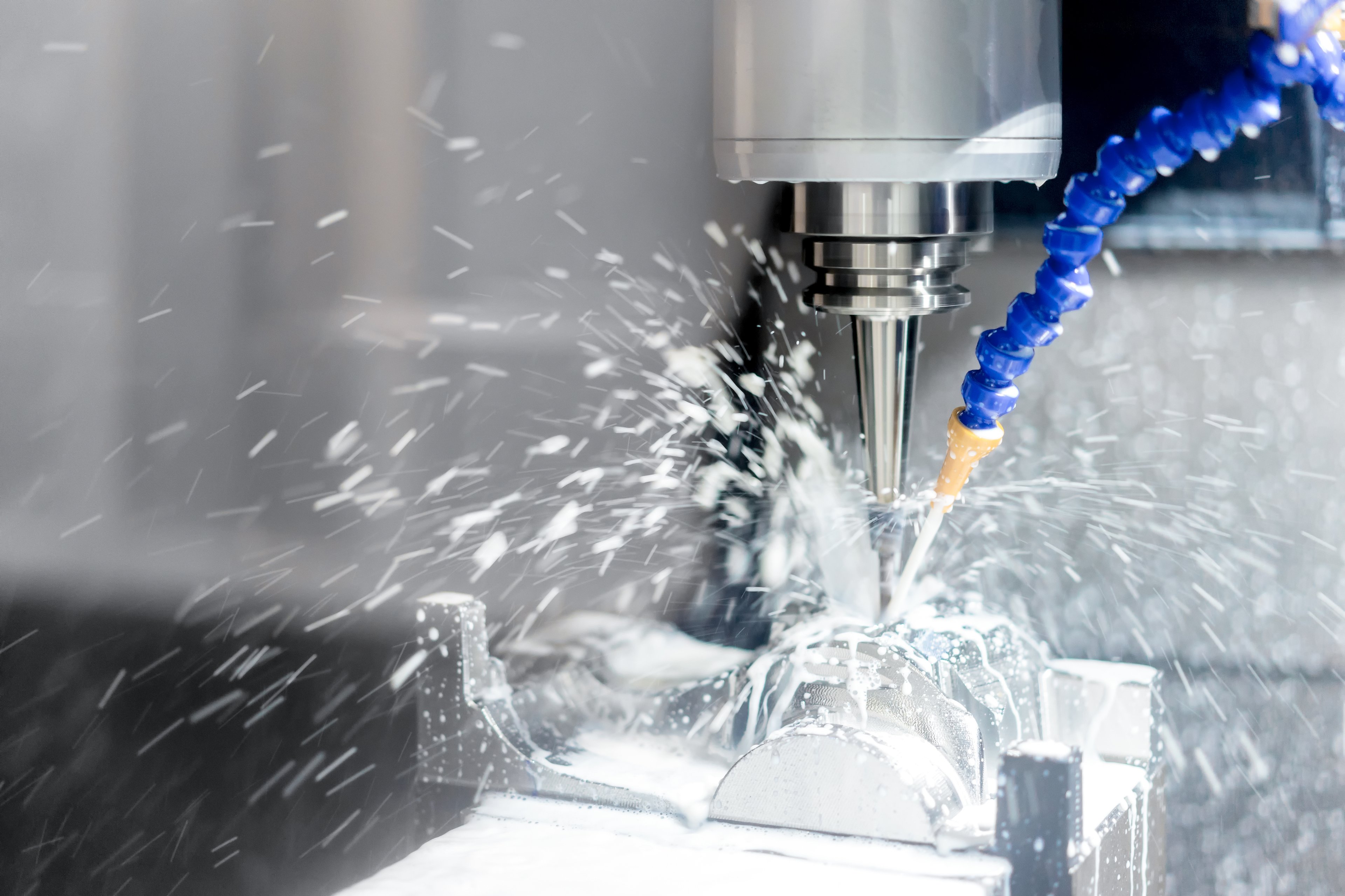 High precision CNC machining center working, operator machining automotive sample part process
