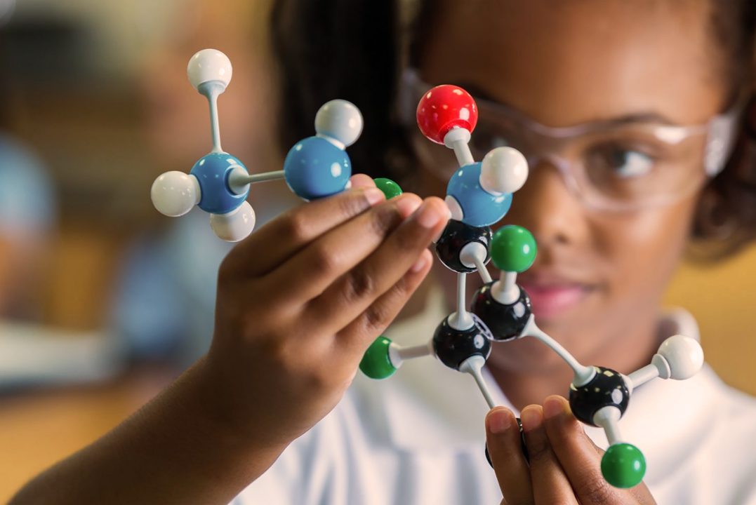 Girl with plastic molecules