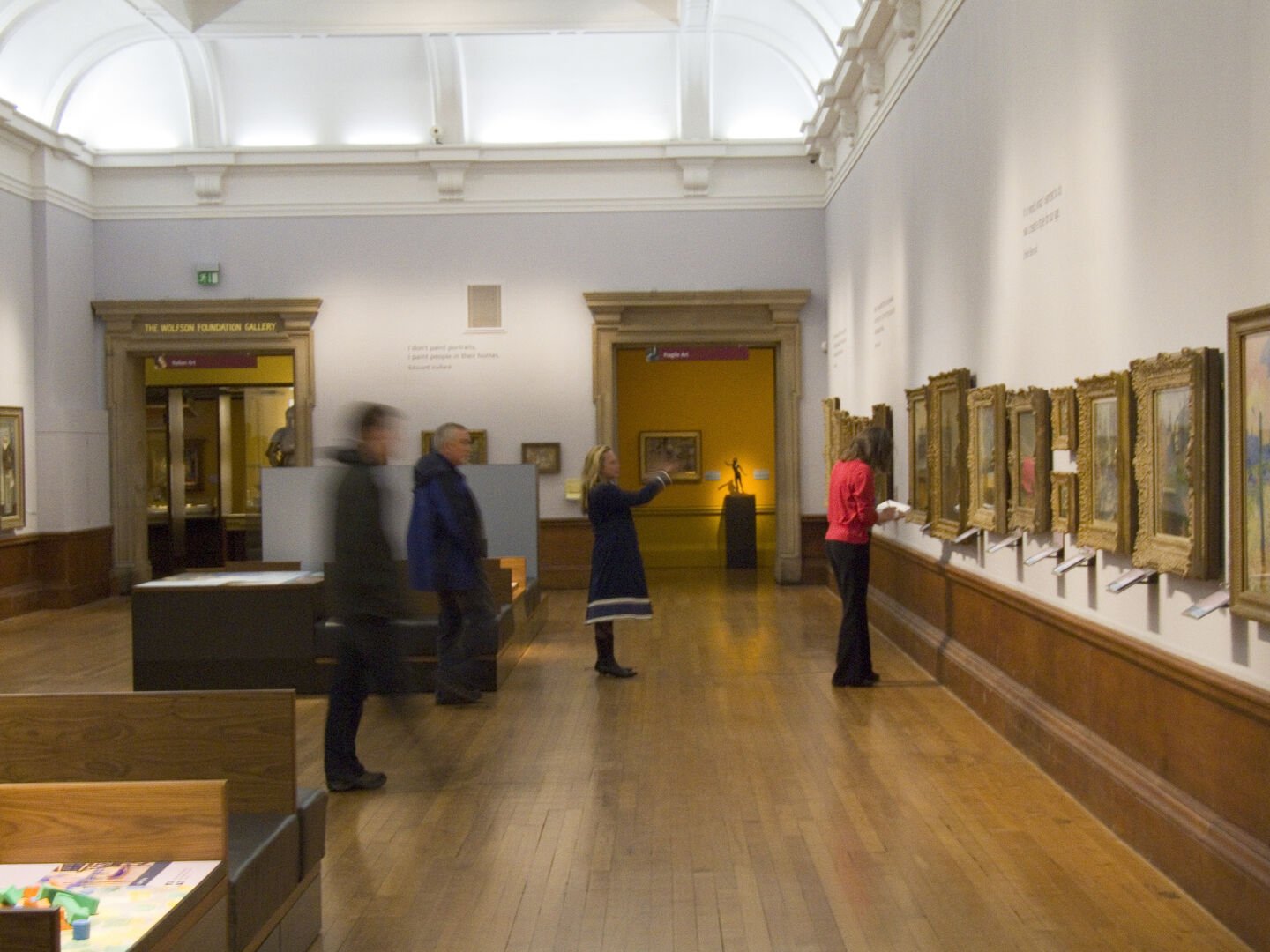 Museum - People viewing painting in a museum